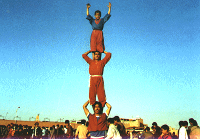 Moroccan acrobats, at the public square of Marrakech