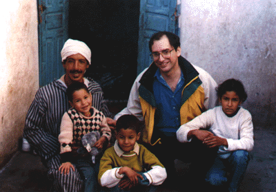 Film maker, Steve Montgomery who grew up in Niskayuna, with snake charmer, Blaid Farrouss and family in Marrakech, Morocco.